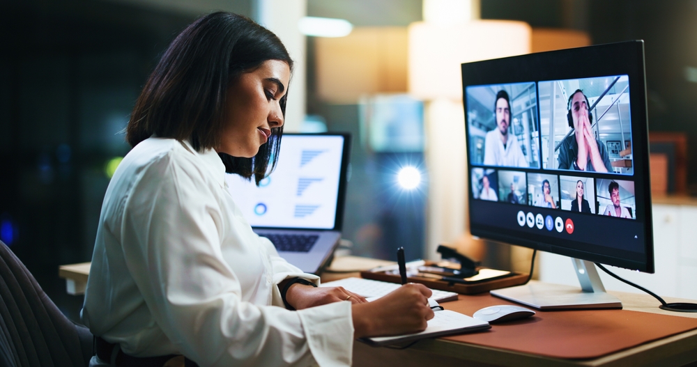 Video,Call,,Computer,Screen,And,Notebook,With,Business,Woman,In